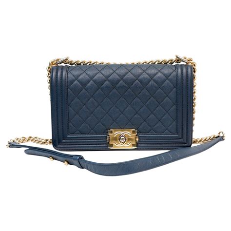 chanel boy navy blue gold|Chanel Boy Bag: Your Guide to Sizes, Styles, Prices .